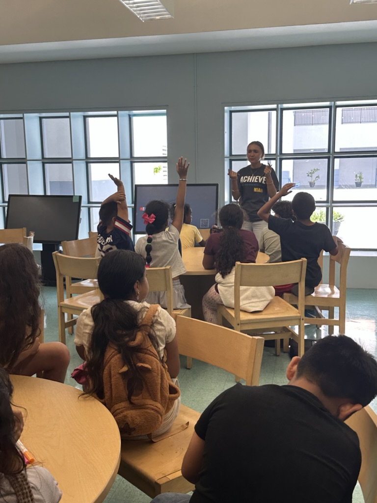 Students raising hands during an Emotion Surfing workshop